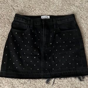 Frame studded mini skirt. Light distress along the bottom. Worn once!